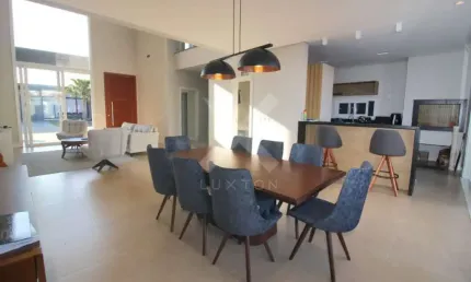 Casa em condomínio fechado com 4 quartos à venda na Rua Rio Divisa, 32, Centro, Xangri-Lá por R$ 2.980.000