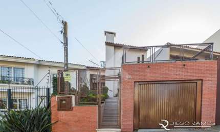 Casa com 3 quartos à venda na Rua Monte Alverne, 56, Chácara das Pedras, Porto Alegre por R$ 850.000