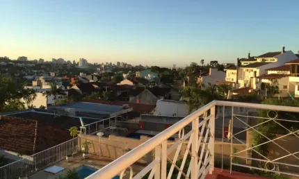 Casa com 5 quartos à venda na Avenida General Barreto Viana, 430, Chácara das Pedras, Porto Alegre por R$ 1.550.000
