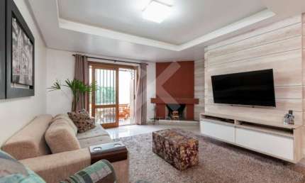 Casa com 3 quartos à venda na Rua Dário Cardoso, 138, Espírito Santo, Porto Alegre por R$ 769.000