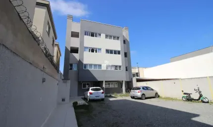 Apartamento no costeira com dois quartos e sacada com churrasqueira