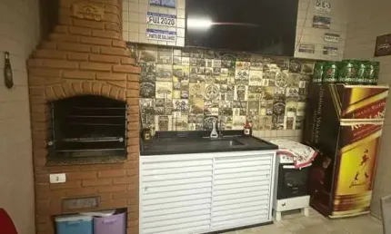 Casa Sobreposta Térrea à Venda no Boqueirão, Santos – 2 Dormitórios, Quintal e Churrasqueira