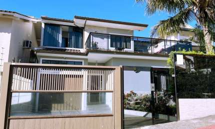 Casa em condomínio fechado com 3 quartos à venda na Rua Padre Osmar Muller, Itaguaçu, Florianópolis por R$ 2.260.000