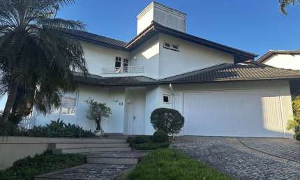 Casa em condomínio fechado com 3 quartos à venda na Rodovia Haroldo Soares Glavan, Cacupé, Florianópolis por R$ 2.950.000
