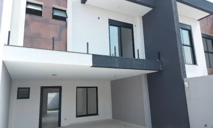 Sobrado estilo moderno, frente para a rua, 3 suítes, 1 vaga coberta
