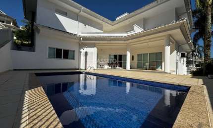 Casa em condomínio fechado com 5 quartos à venda na Estrada Haroldo Soares Glavan, 1000, Cacupé, Florianópolis por R$ 3.700.000