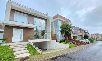 Casa em condomínio fechado com 4 quartos para alugar na Rua Brazílio de Araújo, 341, Cidade Industrial, Curitiba, 400 m2 por R$ 9.500