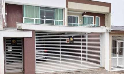 Casa com 4 quartos à venda na Rua Marcos Aurélio Tozzo, Braga, São José dos Pinhais, 198 m2 por R$ 1.100.000