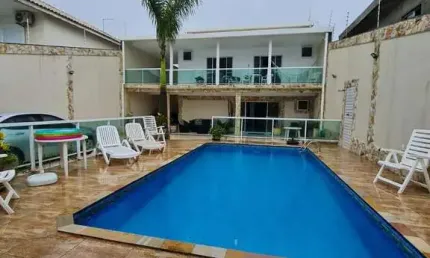 Sobrado em frente ao mar, no balneário flórida - 4 suítes