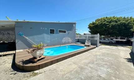 Casa com 4 quartos à venda na Avenida Paranaguá, 2424, Riviera, Matinhos, 160 m2 por R$ 690.000