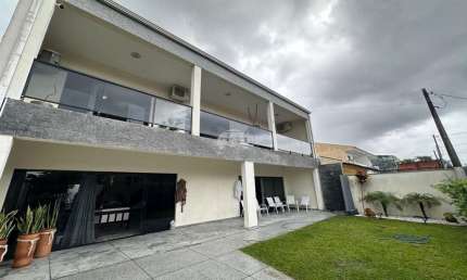 Casa com 3 quartos à venda na Rua Jandáia do Sul, 75, Costa Azul, Matinhos, 227 m2 por R$ 1.480.000