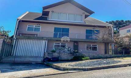 Casa com 5 quartos à venda na Avenida Brasília, 453, Campo Pequeno, Colombo, 450 m2 por R$ 1.150.000
