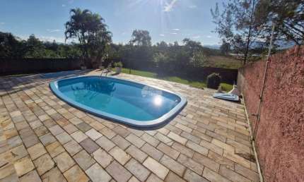 Casa com 5 quartos à venda na Avenida Tiradentes, 640, Mirim, Guaratuba, 200 m2 por R$ 1.600.000