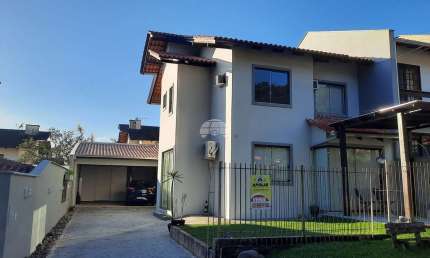 Casa em condomínio fechado com 3 quartos à venda na Rua das Hortências, 181, São Marcos, Joinville, 185 m2 por R$ 1.010.000