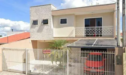Sobrado em rua tranquila 2 suítes churrasqueira 3 vagas de garagem
