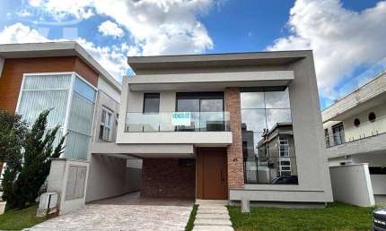 CASA NOVA DE ALTO PADRÃO NO HARMONY VILLAGE CONDOMINIUM, COM 310M², 4 SUÍTES.