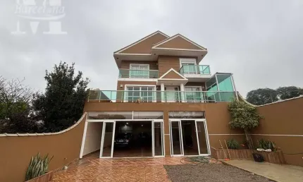 CASA RESIDENCIAL/COMERCIAL. TERRENO COM 540 M². REBOUÇAS. 15 VAGAS DE GARAGEM. 3 SUÍTES