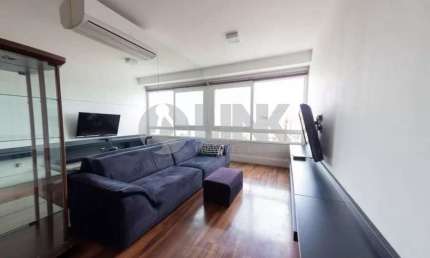 Apartamento mobiliado de 1 quarto com 1 vaga à venda no bairro Cidade Baixa em Porto Alegre