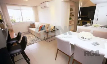 Apartamento mobiliado de 2 quartos com 2 vagas à venda no bairro Menino Deus em Porto Alegre