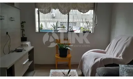 Apartamento térreo de 2 quartos com 1 vaga à venda no bairro Santo Antônio em Porto Alegre