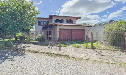 Casa com 5 quartos à venda na Rua Vicente Celestino, 430, Parque Dos Maias, Porto Alegre por R$ 597.000