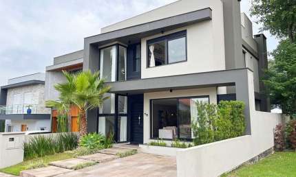 Casa em condomínio fechado com 4 quartos à venda na Rua Francisco Solano Borges, 200, Hípica, Porto Alegre por R$ 1.285.000