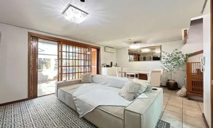 Casa em condomínio fechado com 3 quartos à venda na Avenida Coronel Marcos, 2171, Pedra Redonda, Porto Alegre por R$ 670.000
