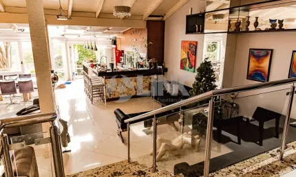 Casa em condomínio com 4 quartos e 4 vagas à venda no bairro Santa Tereza