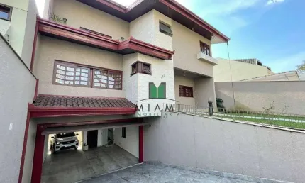 Sobrado com 4 dormitórios à venda, 405 m² por R$ 1.900.000,00 - Tarumã - Curitiba/PR