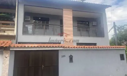 Casa em condomínio fechado com 4 quartos à venda na Rua General Miguel Ferreira, 178, Taquara, Rio de Janeiro, 160 m2 por R$ 688.000
