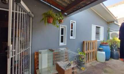 Casa com 3 quartos à venda na Rua Jorge Assun, 2003, Paraíso, Sapucaia do Sul, 98 m2 por R$ 450.000