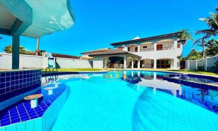 Casa à venda com 5 suítes - Piscina e churrasqueira - Condomínio com segurança e lazer - Jardim Acapulco - Guarujá/SP