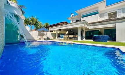 ALTO PADRÃO - Casa à venda com 5 suítes - Piscina, sauna e churrasqueira - Condomínio com segurança e lazer - Jardim Acapulco - Guarujá/SP