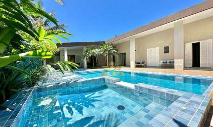 Casa com 6 suítes à venda, Mobiliada e decorada, Condomínio Jardim Acapulco Guarujá.