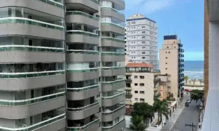 Apto 2 dorms 1 suíte vila tupi, uma quadra da praia , vista mar apenas r$450 mil.