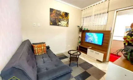 Lindo apartamento em prédio frente mar no canto do forte! financia!