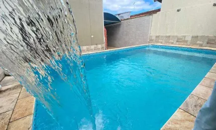 Encantadora Residência de 3 Quartos com Suíte e Área de Lazer