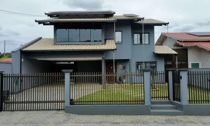 Casa com 4 dormitórios à venda, 248 m² por R$ 1.450.000 - Santo Antônio - Joinville/SC