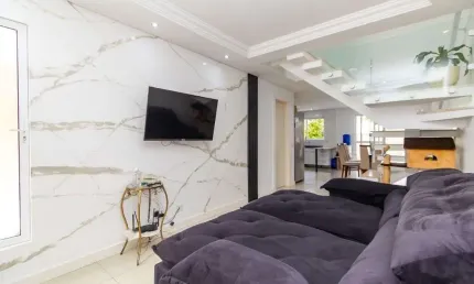 Sobrado com 3 dormitórios à venda, 148 m² por R$ 870.000,00 - Umbará - Curitiba/PR