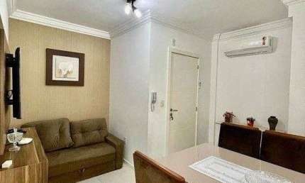 Apartamento mobiliado com 02 dormitórios na praia do centro de Bombinhas