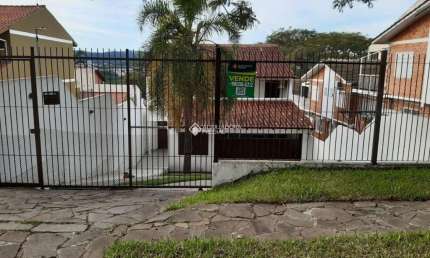 Casa com 3 quartos à venda na Rua Lloyd de Andrade Polidoro, 106, Ipanema, Porto Alegre, 204 m2 por R$ 780.000