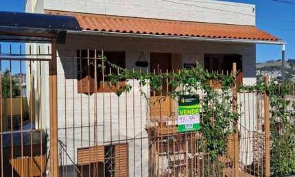 Casa com 4 quartos à venda na Rua Martim Minaberry, 405, Partenon, Porto Alegre, 140 m2 por R$ 400.000