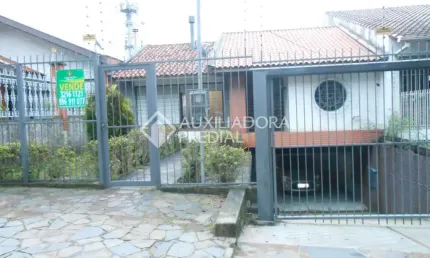 Casa em condomínio fechado com 4 quartos à venda na Rua Tomaz Edison, 127, Santo Antônio, Porto Alegre, 308 m2 por R$ 850.000