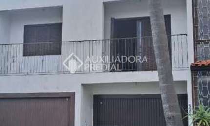 Casa com 3 quartos à venda na Rua Ângelo Passuelo, 390, Vila Nova, Porto Alegre, 262 m2 por R$ 750.000