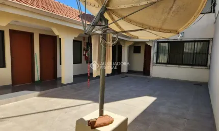 Casa comercial com 9 quartos à venda na Rua Corrêa Lima, 1831, Santa Tereza, Porto Alegre, 605 m2 por R$ 1.200.000