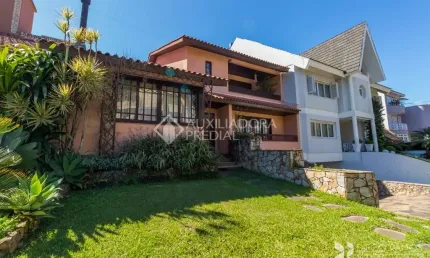 Casa em condomínio fechado com 3 quartos à venda na Rua Tocantins, 869, Lomba do Pinheiro, Porto Alegre, 336 m2 por R$ 2.000.000