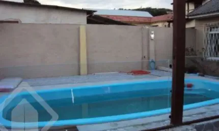 Casa em condomínio fechado com 2 quartos à venda na Rua Pedro Pereira de Souza, 135, Partenon, Porto Alegre, 120 m2 por R$ 489.000