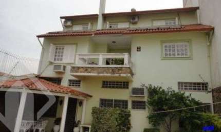 Casa em condomínio fechado com 4 quartos à venda na Avenida Pastor Ernesto Schlieper, 46, São Sebastião, Porto Alegre, 450 m2 por R$ 950.000