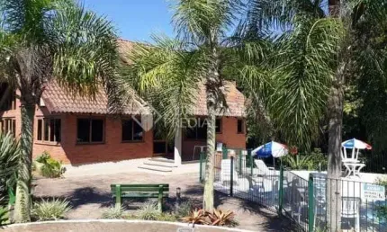 Casa em condomínio fechado com 3 quartos à venda na Rua Adão Gregory, 70, Mário Quintana, Porto Alegre, 178 m2 por R$ 468.000