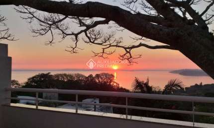 Casa em condomínio fechado com 3 quartos à venda na Rua dos Guaranis, 360, Espírito Santo, Porto Alegre, 195 m2 por R$ 790.000